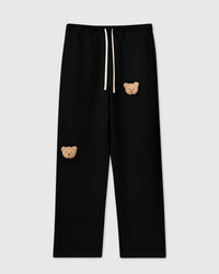 STICKYZOO Sticky Bear Sweatpant in black with two hand-stitched 3D plush teddy bear face appliques