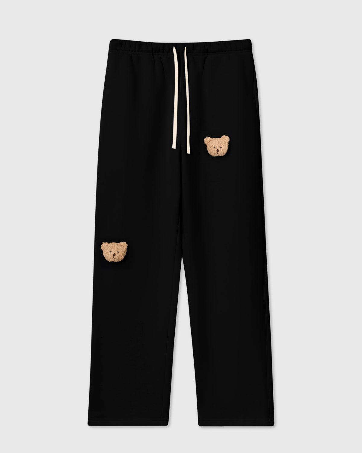 STICKYZOO Sticky Bear Sweatpant in black with two hand-stitched 3D plush teddy bear face appliques