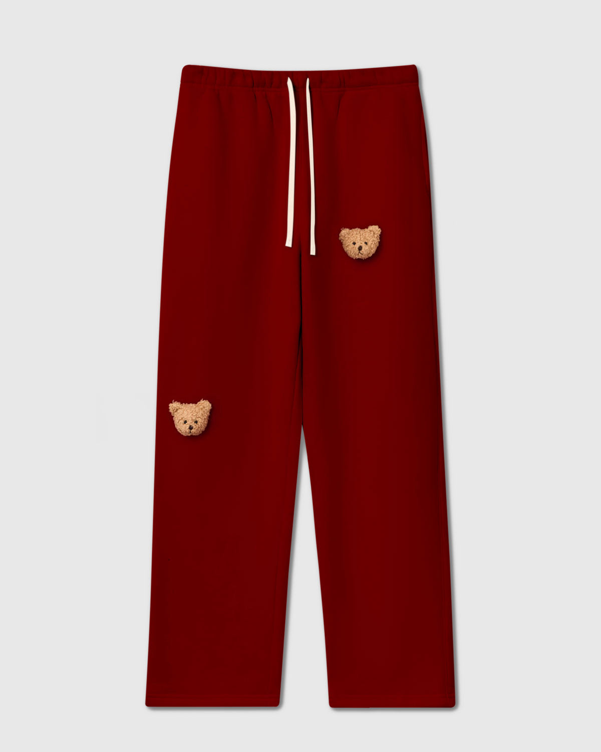 STICKYZOO Sticky Bear Sweatpant in red with two hand-stitched 3D plush teddy bear face appliques