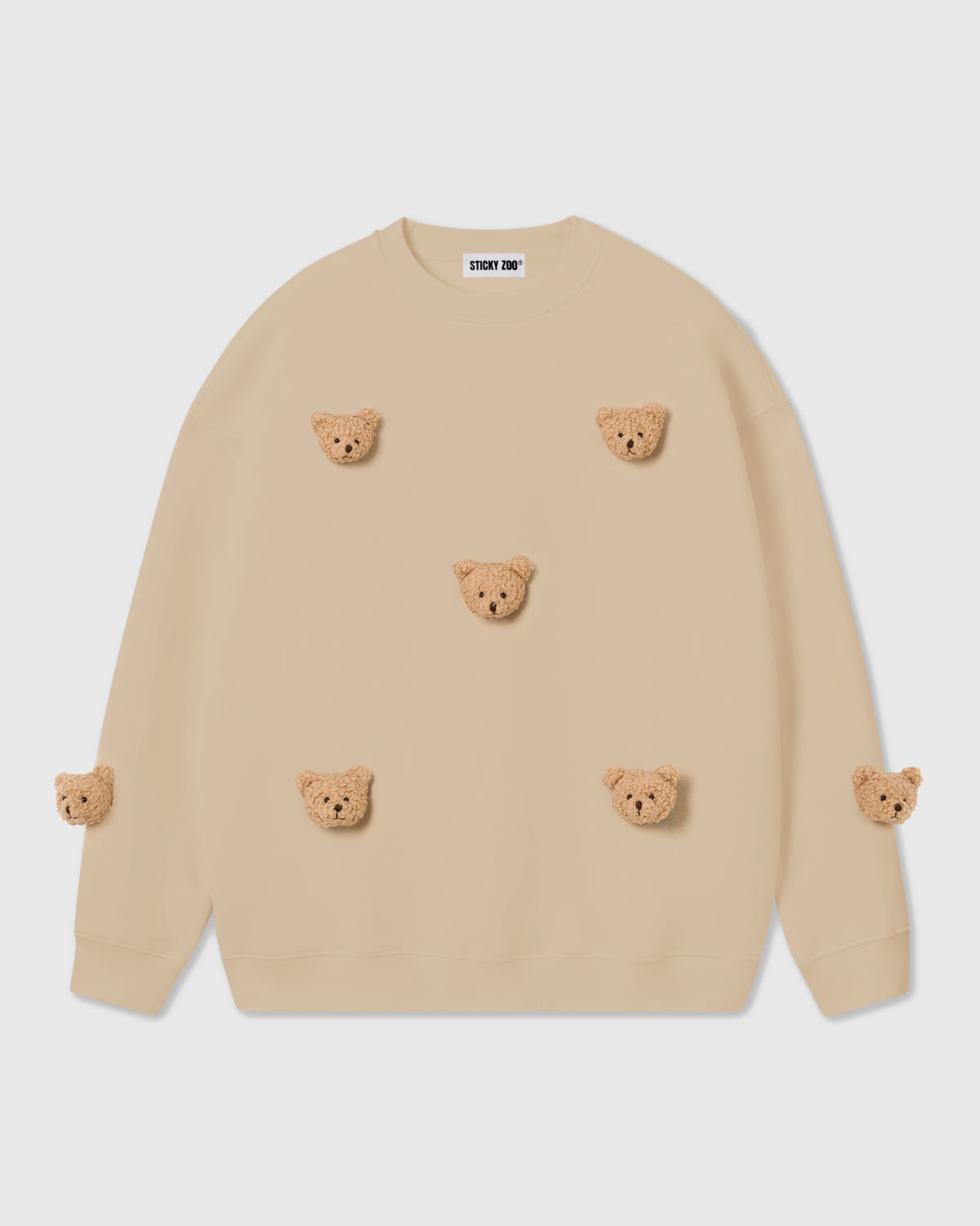 STICKYZOO Sticky Bear Sweatshirt in cream with six scattered plush bear face appliques