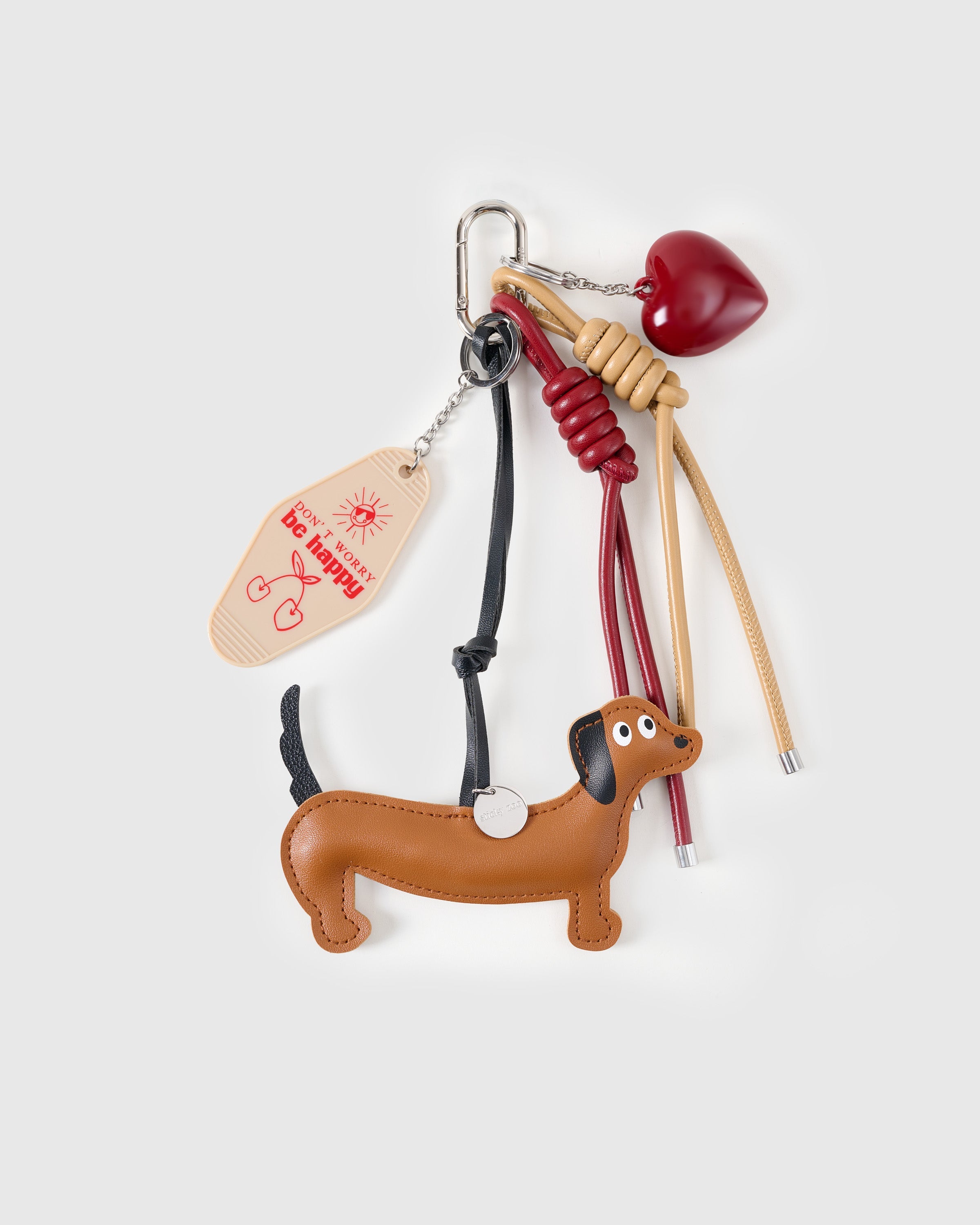CHARM NG DACHSHUND NA YUMAKAP SA HOTDOG