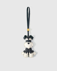 The urban schnauzer charm is made from genuine French Alran goatskin and French suede — real full-grain leather. Never vegan. Never synthetic. The difference shows.