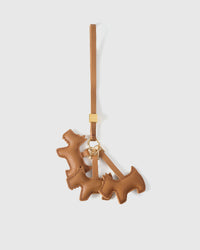 Each triple schnauzer charm is finished one at a time, by hand. Not mass-produced.