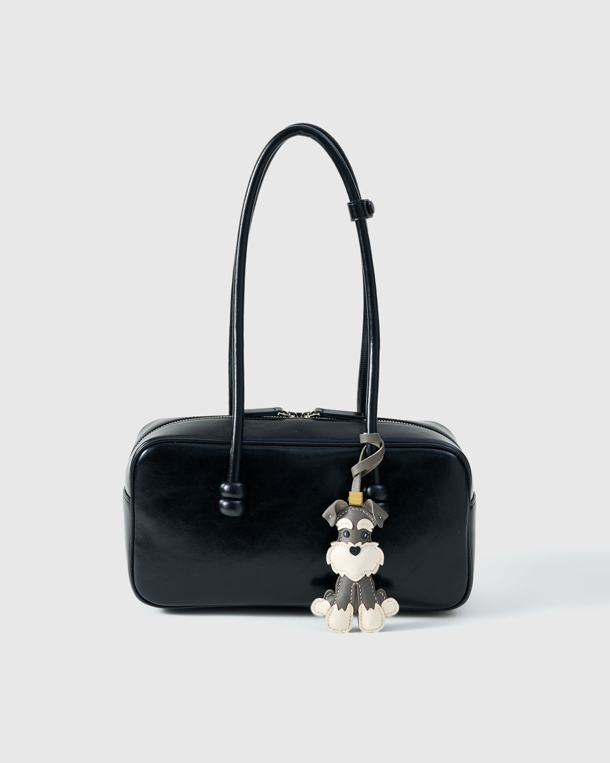 18K gold-plated hardware engraved with the STICKYZOO mark. Finished by hand. Designed in Amsterdam.