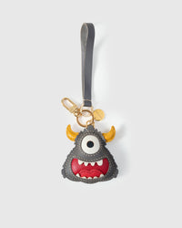 Little monster on an 18K gold-plated keychain clip with engraved STICKYZOO disc — clips to keys, bags or backpacks.