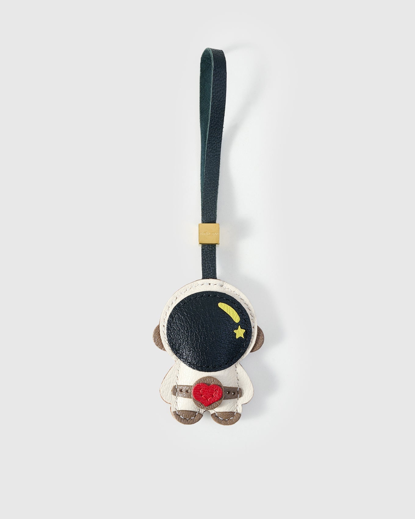 ASTRONAUT CHARM charm handmade from French Alran genuine goatskin — A bear in a spacesuit, holding a red heart. The helmet. Three days by hand. Arrives in luxury gift packaging. Designed in Amsterdam.