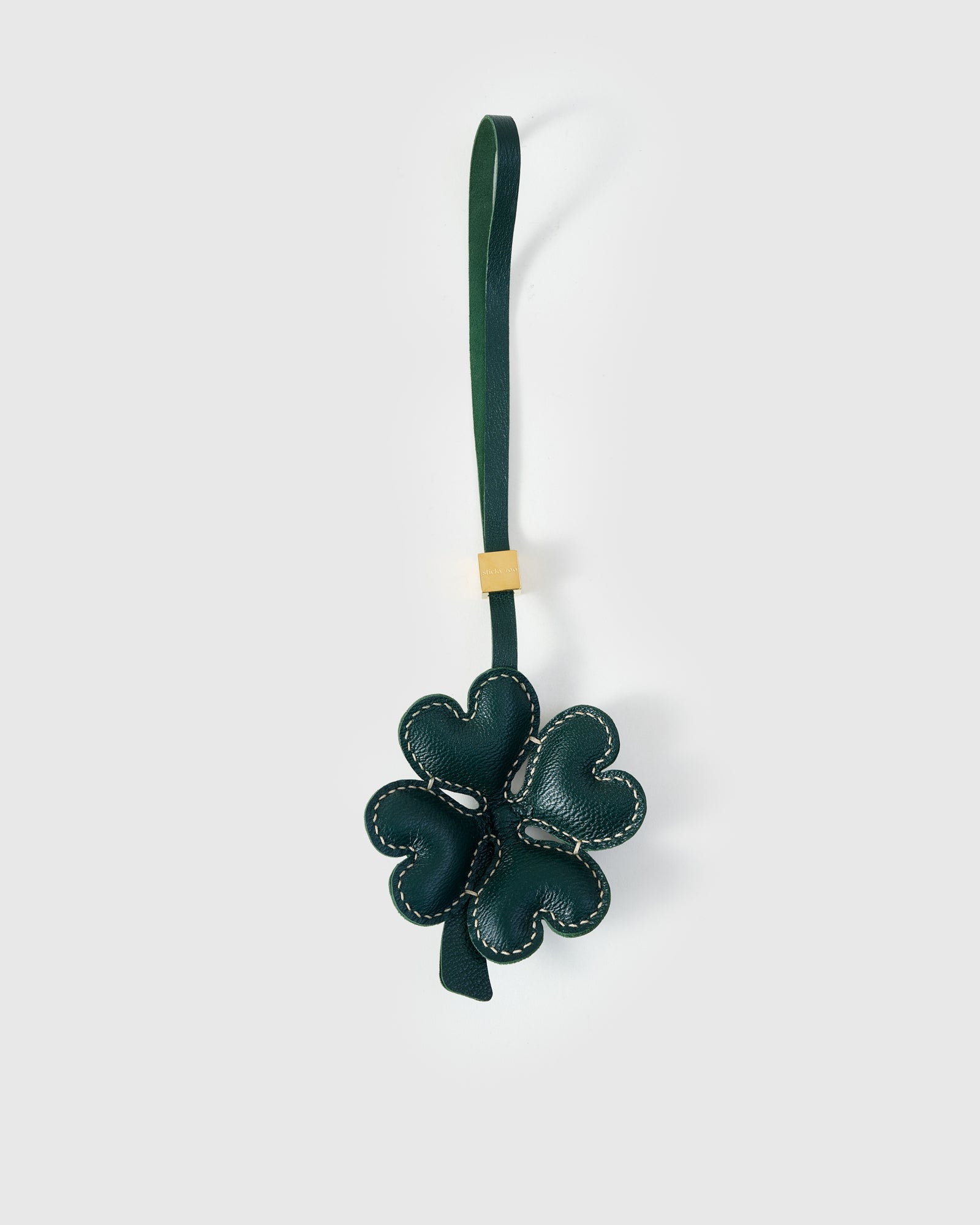 STICKYZOO Lucky Clover Charm — padded heart-shaped petals in black padded 3D French Alran goatskin. 3-day handmade piece.