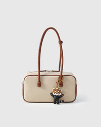 RED PANDA CHARM charm styled on a bag — a small, specific piece that turns a simple bag into a personal one.