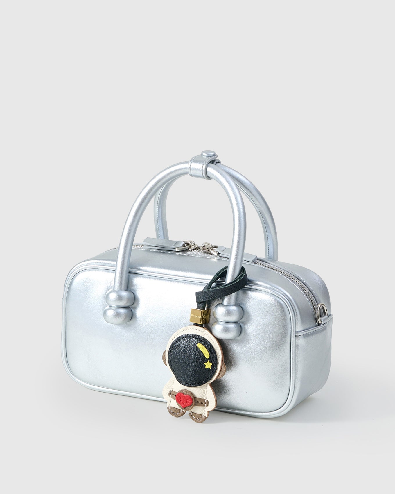 ASTRONAUT CHARM — finished one at a time, by hand. Real French Alran goatskin.