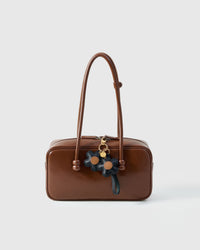 STICKYZOO Twin Flowers Charm in navy with tan centres French Alran goatskin. Hand-cut, hand-stitched. Designed in Amsterdam.