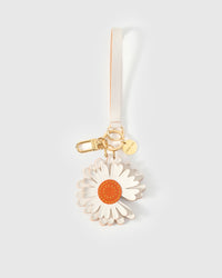 STICKYZOO Daisy Charm in white with orange suede centre French Alran goatskin. Hand-cut, hand-stitched. Designed in Amsterdam.