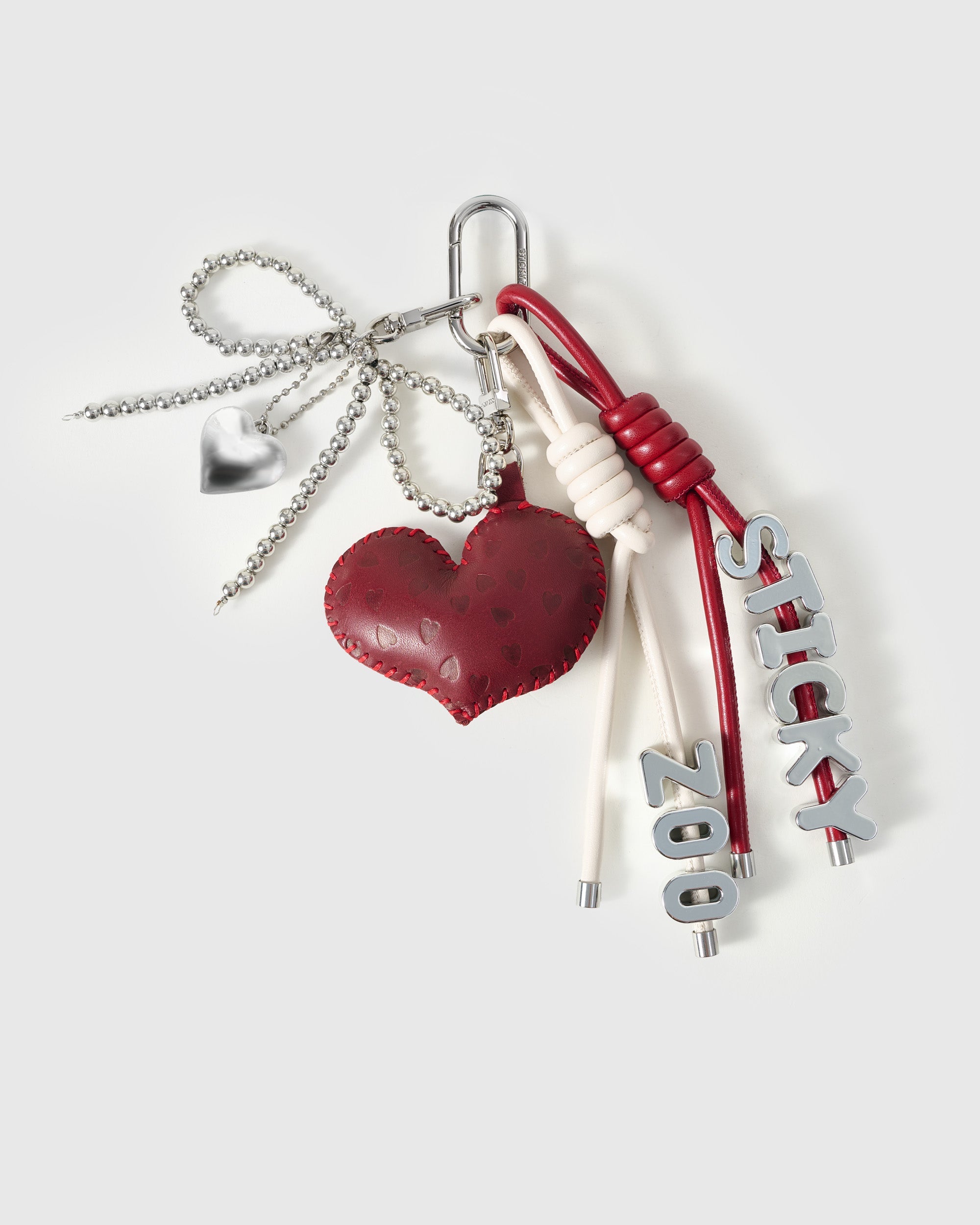 CHARM NG STICKY HEART BOW STACK