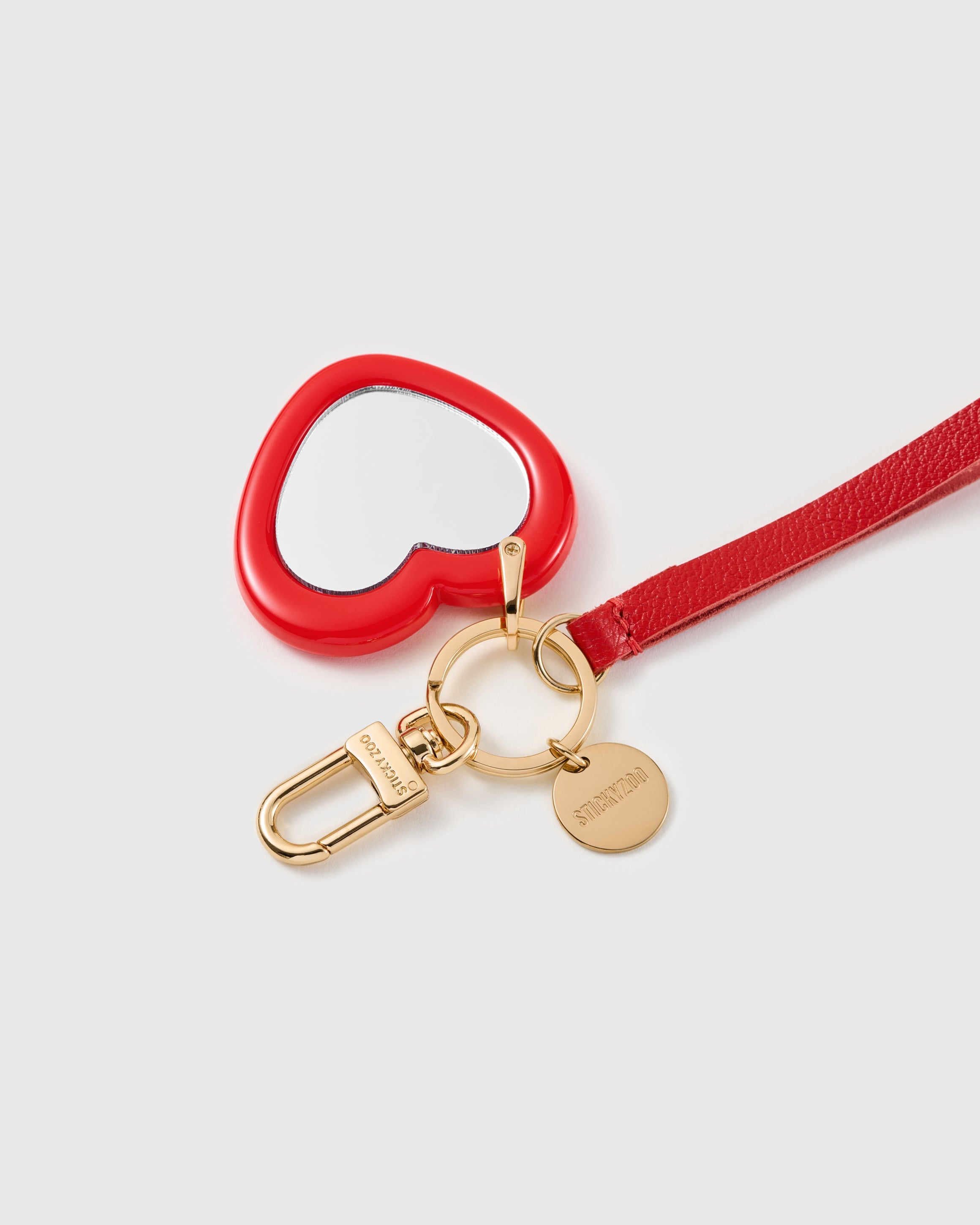 CRIMSON MIRROR HEART LEATHER STRAP NG TELEPONO  