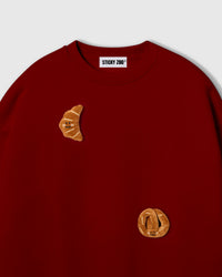 DOBLE CROISSANT NA SWEATSHIRT