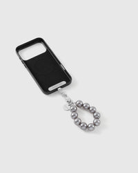 Grey pearl strap attached to a phone case with the included Phone Strap Card