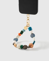 Safari mixed bead wrist strap clipped to a black phone case for hands-free carry