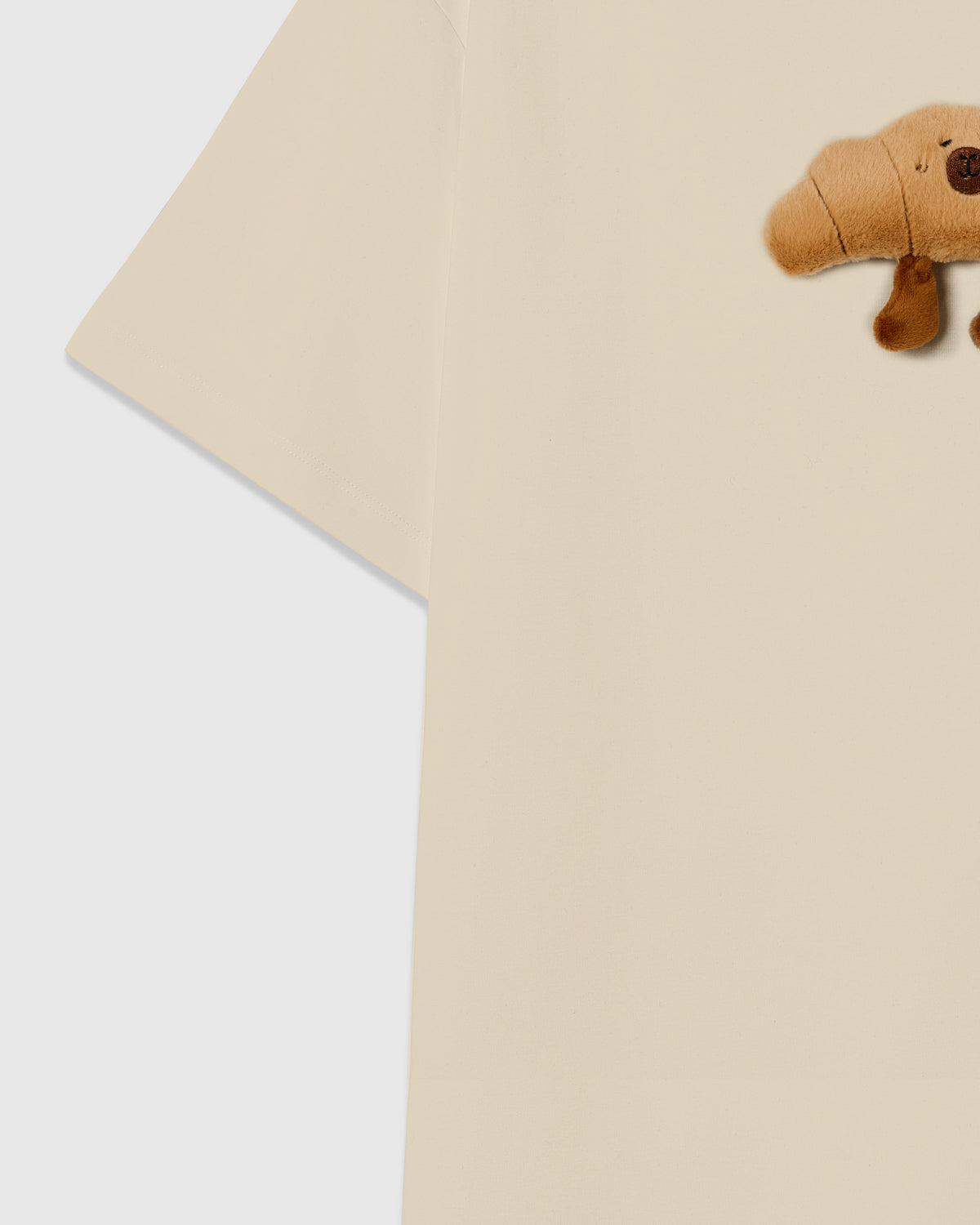 TUMATAKAS NA CROISSANT NA T-SHIRT