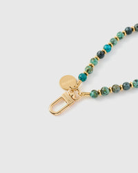 STRAP NG TELEPONO NA MAY TURQUOISE SPECKLE ORBIT