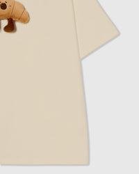 TUMATAKAS NA CROISSANT NA T-SHIRT