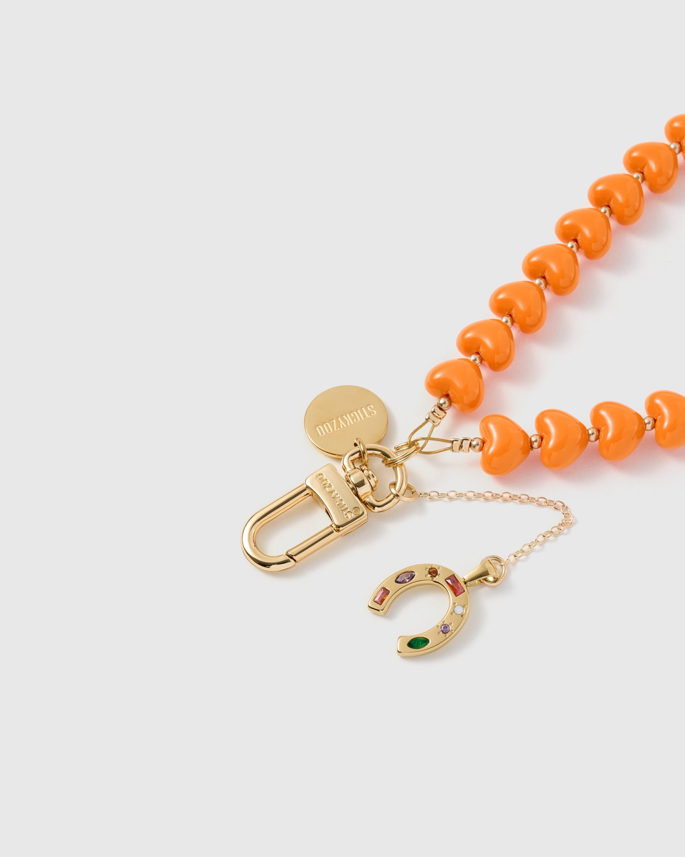 TANGERINE HORSESHOE HEART STRAP NG TELEPONO  