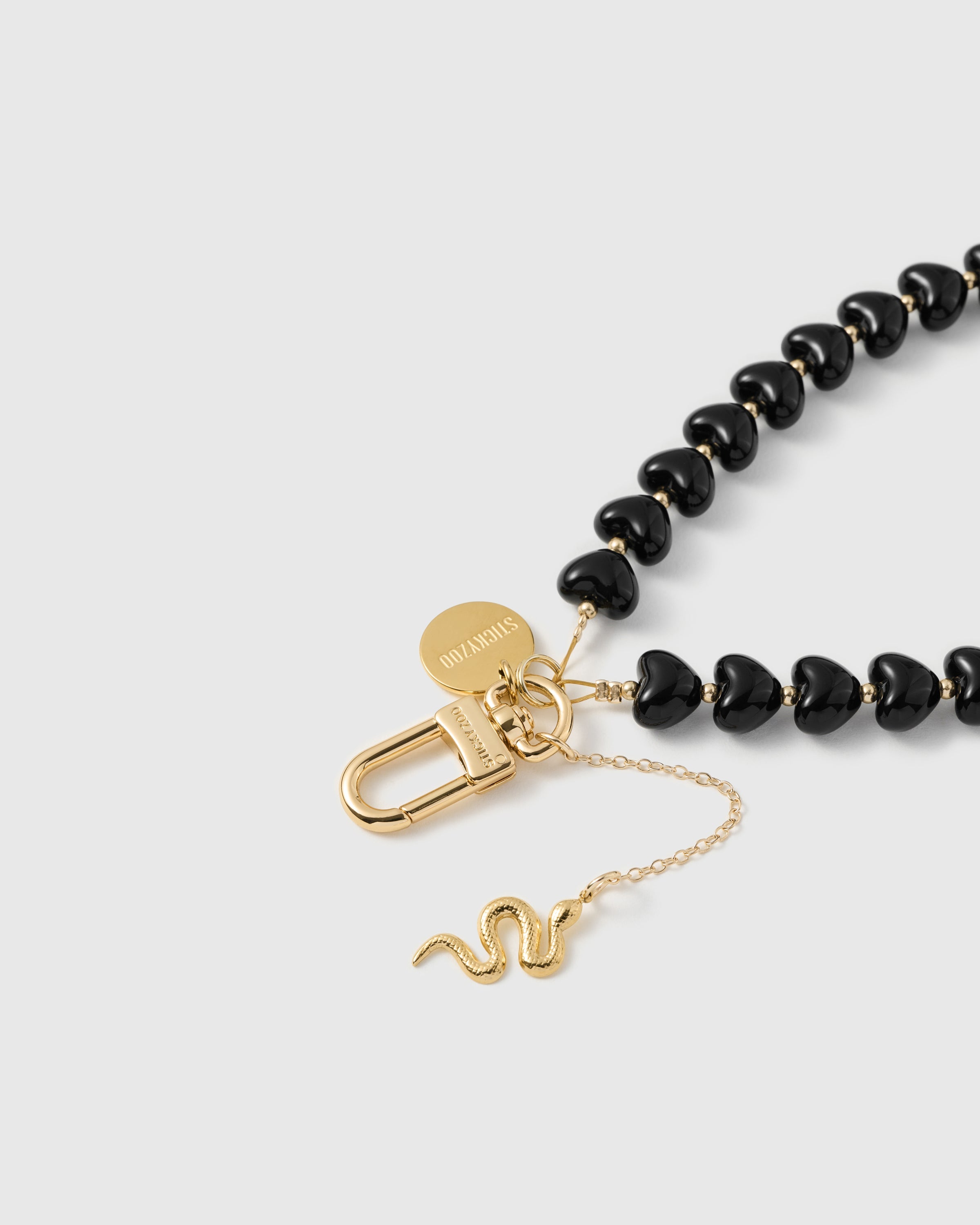 NOIR SNAKE HEART STRAP NG TELEPONO  